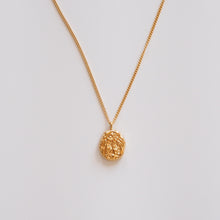 Load image into Gallery viewer, Gold necklace with uneven surface pendant
