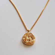 Load image into Gallery viewer, Gold necklace with uneven surface pendant
